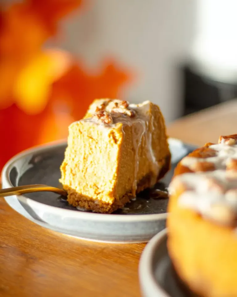 Serving slice of pumpkin pecan cottage cheese bake