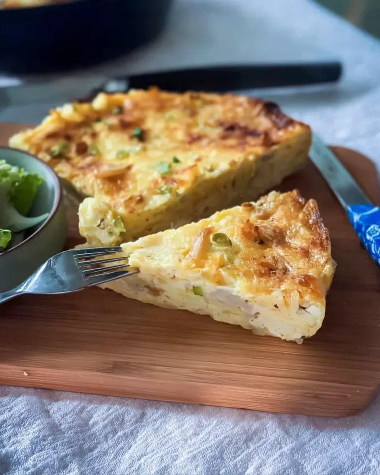 Slice of tortilla cottage cheese chicken pie on a plate