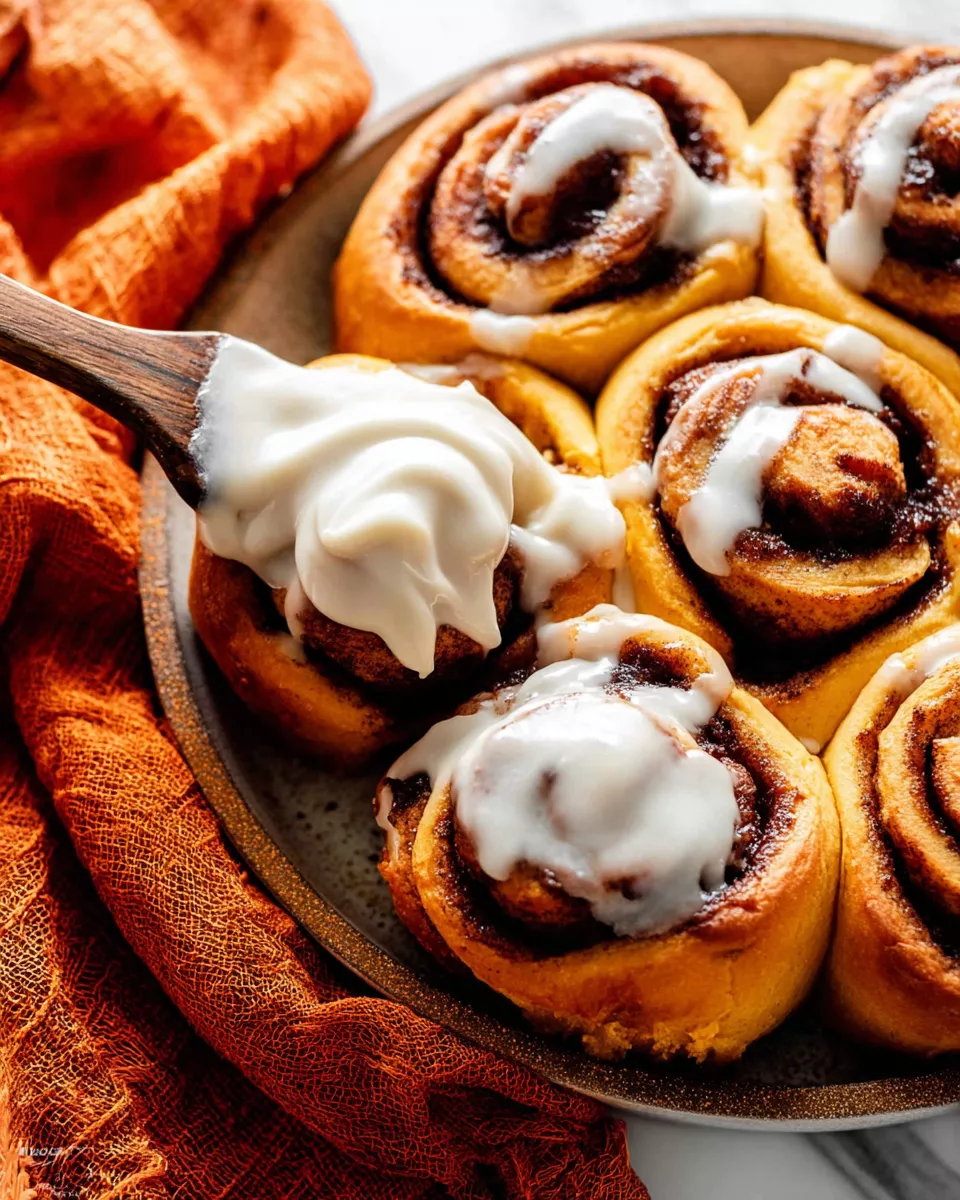Pumpkin Cinnamon Rolls (Soft, Cozy, and Maple-Frosted)