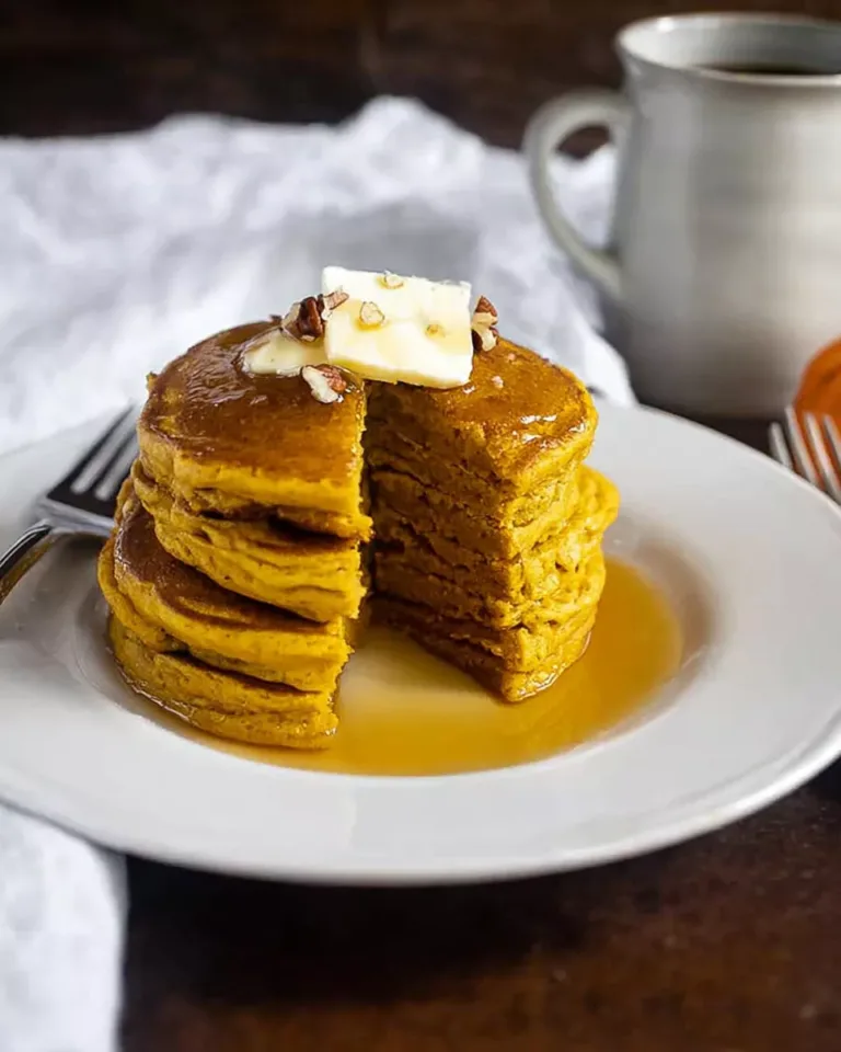 Pumpkin pancakes served with toppings